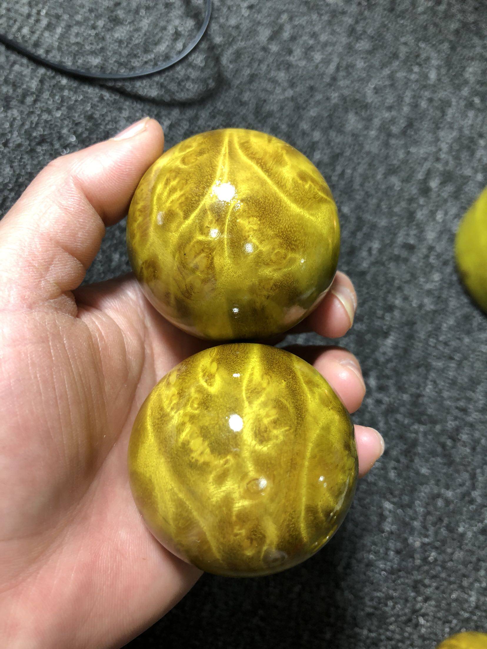 Manufacturer direct sales large leaf gold silk nanwood health care ball activating ball fitness ball handball gold Zhangmu Wen playing handlebar piece