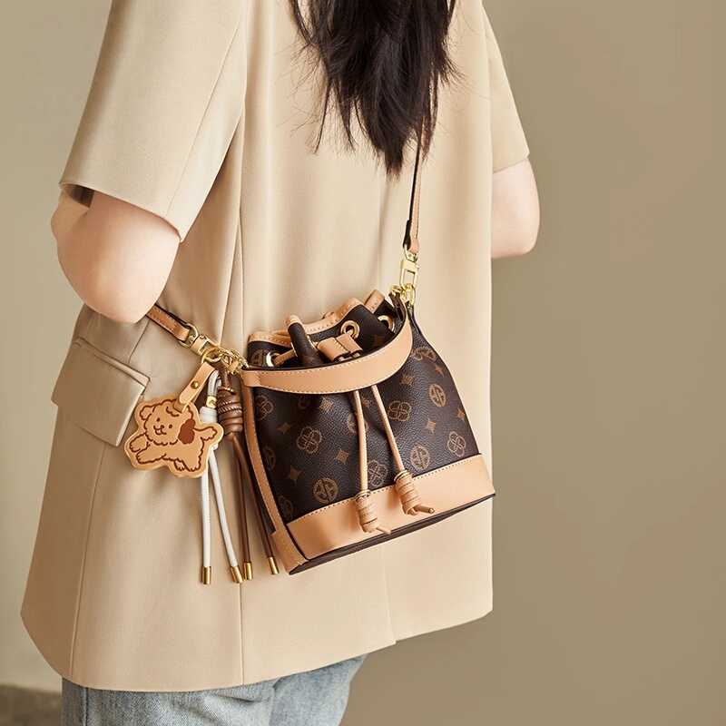 French Dudk Light Luxury Retro Monogram Drawstring Mini Bucket Bag Versatile Genuine Leather Handbag Women's Crossbody Bag French Dudk Light Luxury Retro Monogram Drawstring Mini Bucket Bag Versatile Genuine Leather Handbag Women's Crossbody Bag