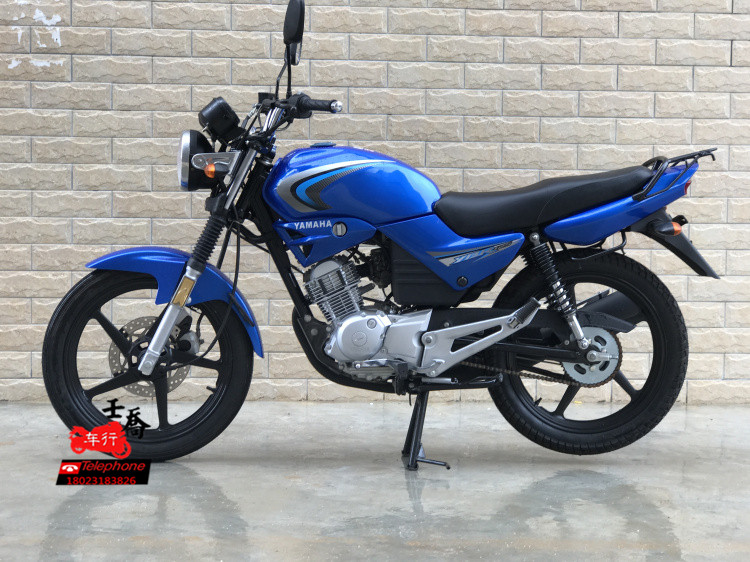 Được sử dụng Yamaha Tianjian xe máy 125C cưỡi loại straddle bốn thì Yamaha bước bánh nam quần áo xe máy