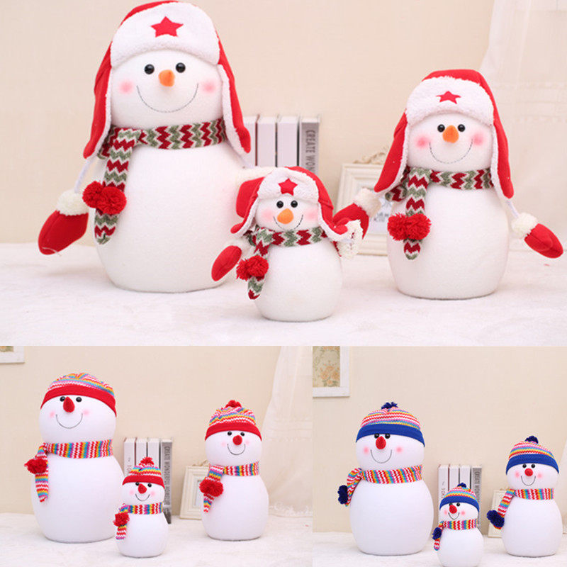 Christmas decorations a family of three snowman dolls stand up for an upscale Lei Feng hat doll Christmas presents