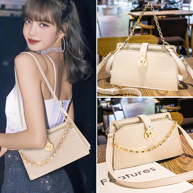 Singapore women's bag 2021 new official flagship stone tattoo with genuine leather texture Leather Texture Axillary single shoulder inclined satchel