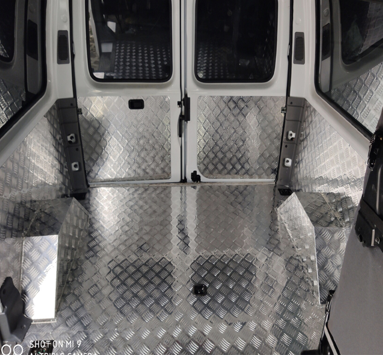 Jiangling Teshun stainless steel floor full shun modified accessories Ford classic foot pad car aluminum plate van floor mat