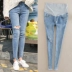 Bà bầu quần jeans mùa hè mới thời trang nâng bụng quần Phiên bản Hàn Quốc khoét lỗ nhỏ là quần lửng chín xuân hè Phụ nữ mang thai quần / quần bụng