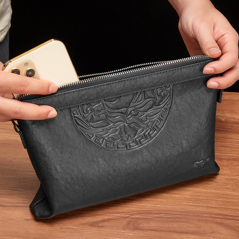 The new seven wolves handbag men's leather fashion trendy brand clutch bag top layer cowhide clutch bag men's envelope bag