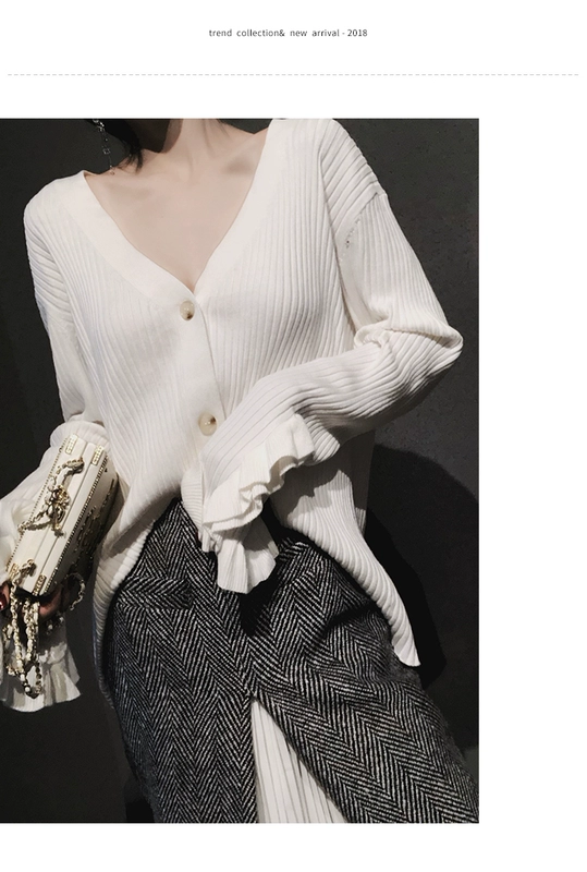 [Jie Ge JG] Áo len nữ cổ chữ V dài tay màu trắng 2018 thu đông và áo len mùa đông kiểu dáng áo len kiểu Hồng Kông áo len tay phồng