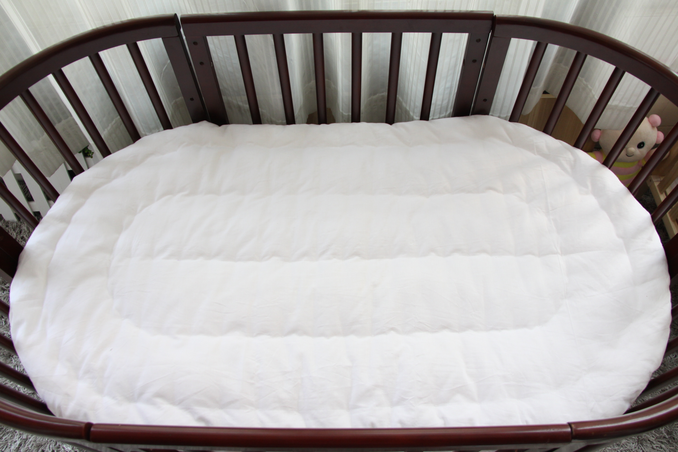 oval baby cot