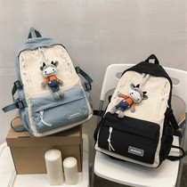 Primary and middle school students school bags three to six grade boys light double shoulder bag large capacity minus minus ultra-light tourist backpack women