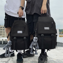 Junior high school double shoulder bag Girl 2020 new Korean version primary and middle school mens fashion trends tourism large capacity minus knapsack