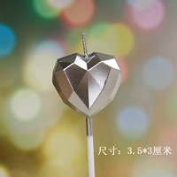 Серебряная свеча в форме алмаза