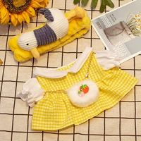 Желтая повязка на голову, цветная юбка, клубника