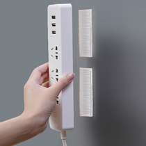 Plug-row holder socket wall-mounted nail-free punch-free patch panel towing line remote control router storage wall