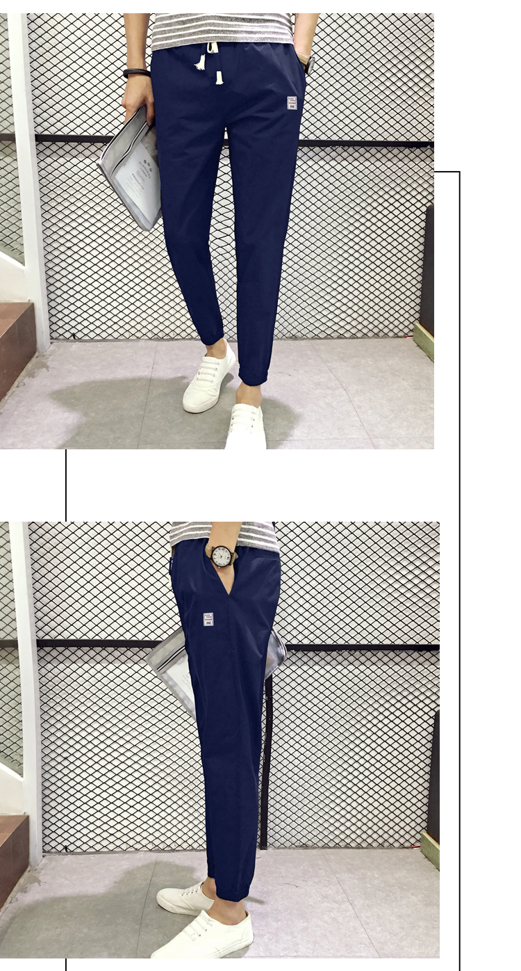Quần thể thao nam mùa xuân và quần mùa thu Phiên bản Hàn Quốc của quần ống rộng chín điểm sát miệng chân nhỏ quần nam xu hướng size lớn quần Wei quần kaki nam