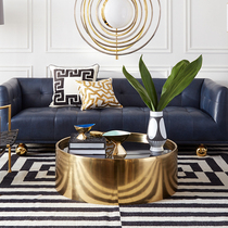 Italian light luxury small apartment living room round marble coffee table Black glass surface simple model room Villa club flower a few