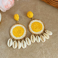 Желтые плетеные серьги