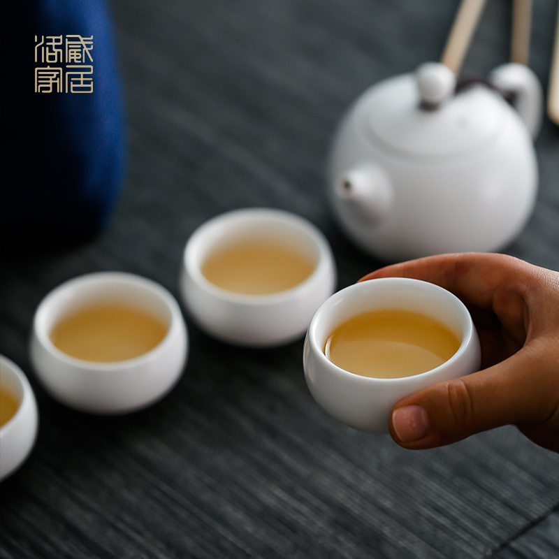 , white porcelain tea set household contracted portable travel to crack a small set of kung fu tea cups tea tray