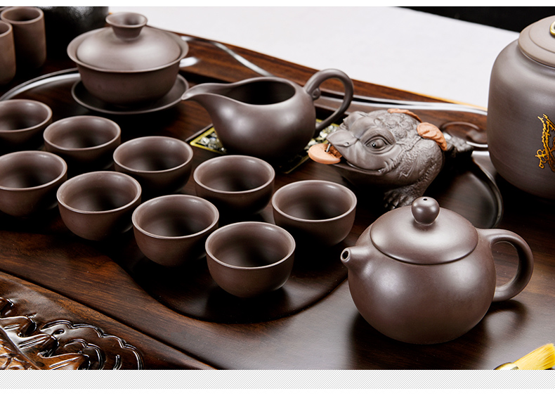 The pavilion side of ebony carved wood tea tray ceramic teapot automatic tea tea set household kung fu tea taking