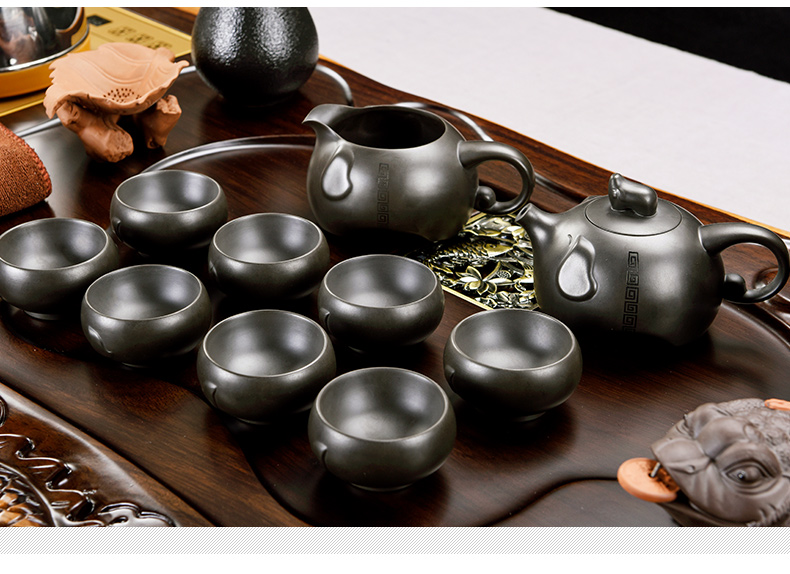 The pavilion side of ebony carved wood tea tray ceramic teapot automatic tea tea set household kung fu tea taking