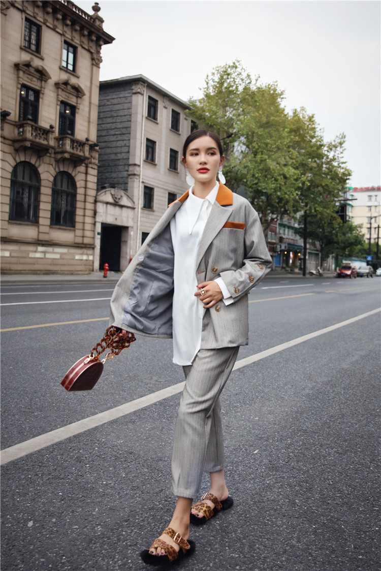 Original retro bất đối xứng pocket hit màu gió Anh phù hợp với áo khoác rộng quần chân yếm suit casual mùa thu mới quần áo đẹp nữ