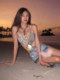 Swimsuit women's high-end 2025 hot spring sexy pure bikini beach vacation three-piece set beautiful slit long skirt