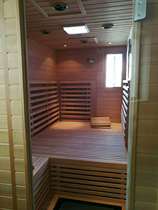 Villa door-to-door construction sweat steaming room Far infrared whole house custom light wave room full solid wood carbon crystal plate sweat steaming high-end