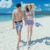 Cặp đôi mới bơi đồ bơi ngực nhỏ tụ tập gợi cảm bikini bikini ba mảnh áo tắm nữ thoải mái đi biển