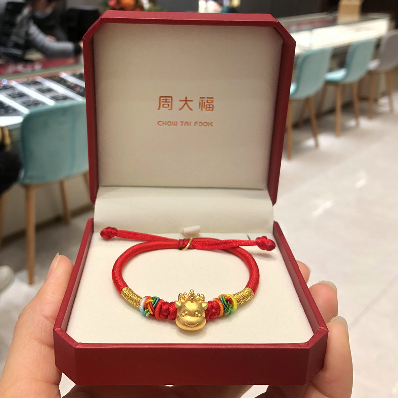 Hong Kong Chow Tai Fook counter 999 feet golden zodiac ox hand chisel baby hand rope baby child birth year anniversary ceremony