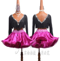 Jia Huixin Latin dance competition clothes high-end performance clothes childrens black V-neck long-sleeved tassel Fish Bone Skirt