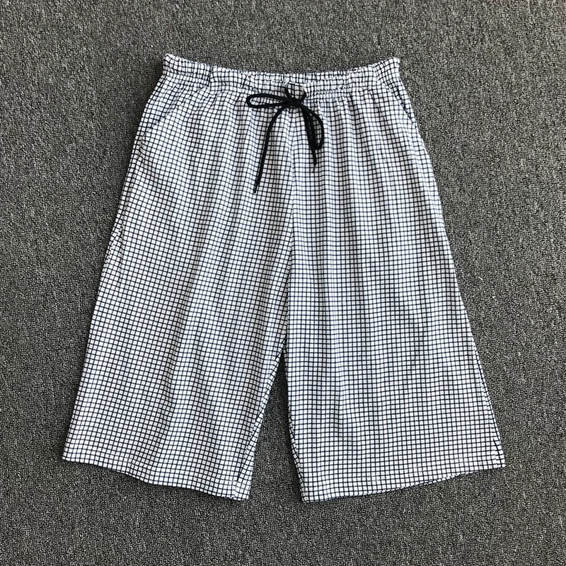 Quần short nam mùa hè Hàn Quốc cotton kích thước lớn đồ ngủ cotton rộng mùa hè Quần tây nam giản dị có thể mặc