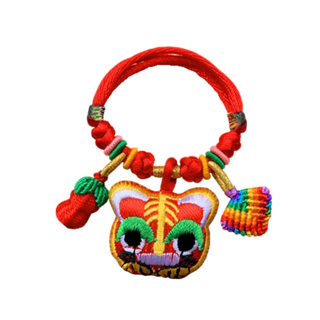 ເດັກນ້ອຍເດັກນ້ອຍ embroidered tiger head bracelet red rope fetal hair bag Dragon Boat Festival rice dumpling strawberry pendant child bracelet anklet