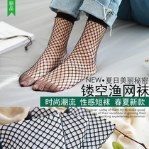 Fishnet socks womens mid-tube socks medium long summer thin Japanese sexy Korean black hollow large mesh stockings