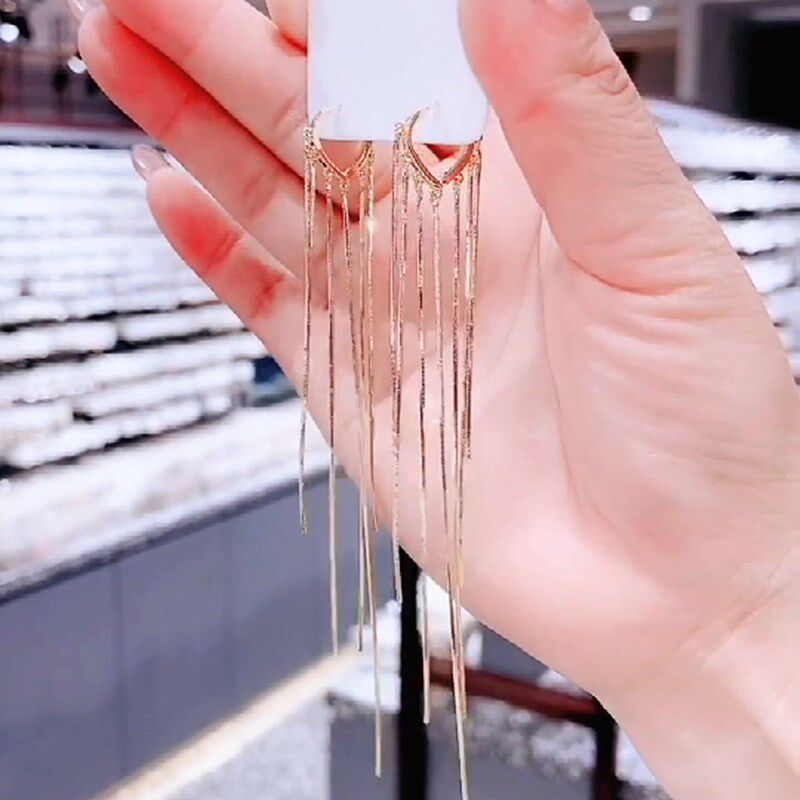 2020 new tide personality simple stream of the Han Edition 925 silver needle super fairy and thin love earring