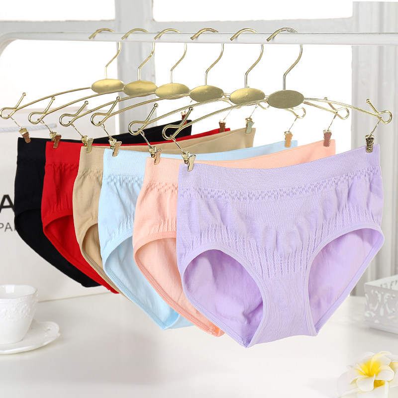 4 pairs of women's underwear sexy solid color Japanese belly-lifting butt-lifting panties women's bag buttocks seamless mid-waist briefs