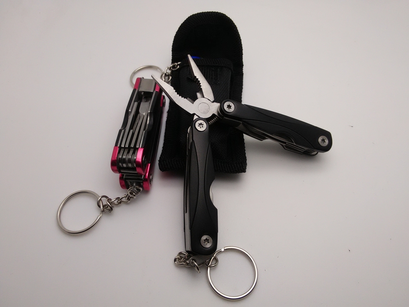 Mini đa chức năng kết hợp quà tặng ngoài trời di động đa mục đích kìm công cụ phổ key ring pocket công cụ kìm