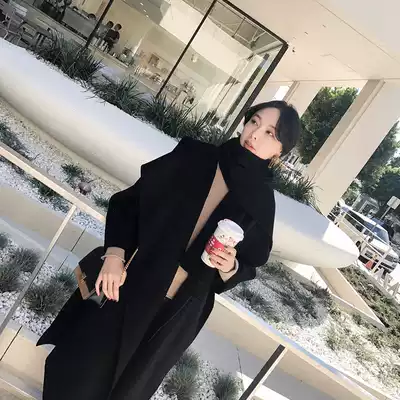2021 Autumn and winter temperament large lapel black double-sided cashmere coat women's long profile loose woolen jacket