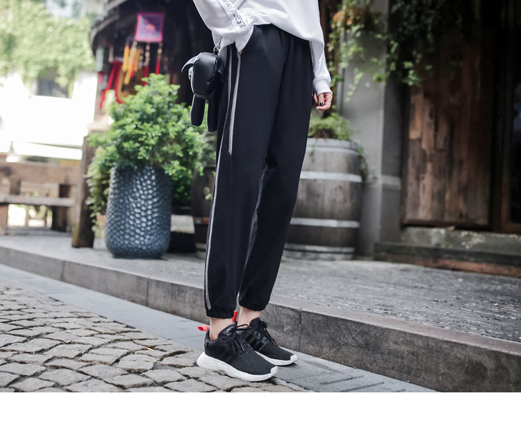 Quần harem size lớn mùa thu và đông nữ lỏng lẻo miệng sinh viên quần thể thao béo mm hoang dã chín quần thường quần jean lửng nữ