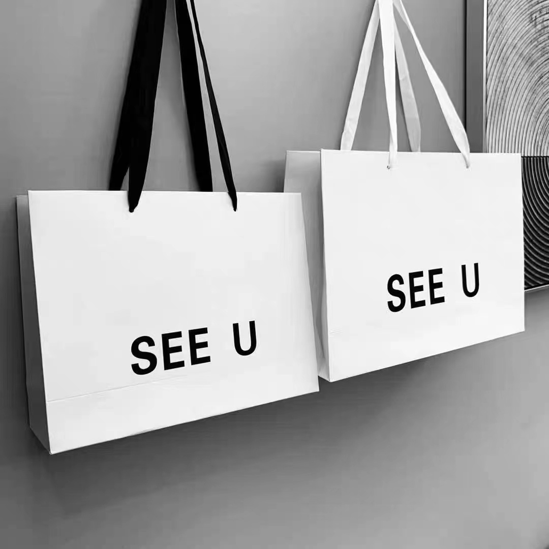 Fashion simple handbag custom printing logo shoe box men's and women's clothing store cosmetic gift bag paper bag custom-made