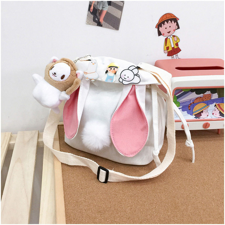 Детская сумка на ремне 春夏新款学生帆布小包包甜美淑女撞色单肩包可爱潮挂件抽绳斜挎包 Jifanpaul