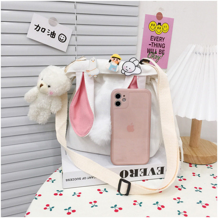 Детская сумка на ремне 春夏新款学生帆布小包包甜美淑女撞色单肩包可爱潮挂件抽绳斜挎包 Jifanpaul