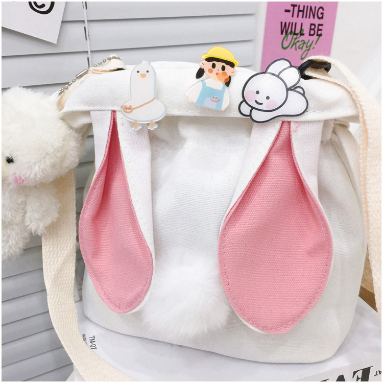 Детская сумка на ремне 春夏新款学生帆布小包包甜美淑女撞色单肩包可爱潮挂件抽绳斜挎包 Jifanpaul