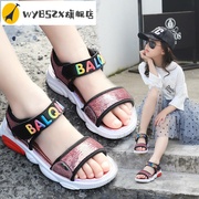 Cô gái Sandals 2020 Summer New 100 sequin chúa giày học sinh tiểu học mang dép giày bãi biển trẻ em lớn của.