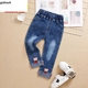 quần trẻ em mùa xuân và mùa thu cô gái mới quần jeans denim bùng quần nữ bé giản dị quần dài.