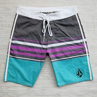 Cuộc thi thể hình nam mùa hè Qi Đầu gối quần short bãi biển Lướt sóng bơi thoáng khí đàn hồi Slim Sản phẩm mới quần đi biển đẹp rẻ