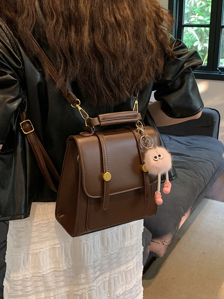 英伦复古双肩包女2026新款时尚百搭单肩斜挎包高级感手提学生背包