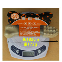 Pooch grindle with a large canine in addition to the mouth and teeth a large canine dedicated to the dog and a brush and brush training dog snacks