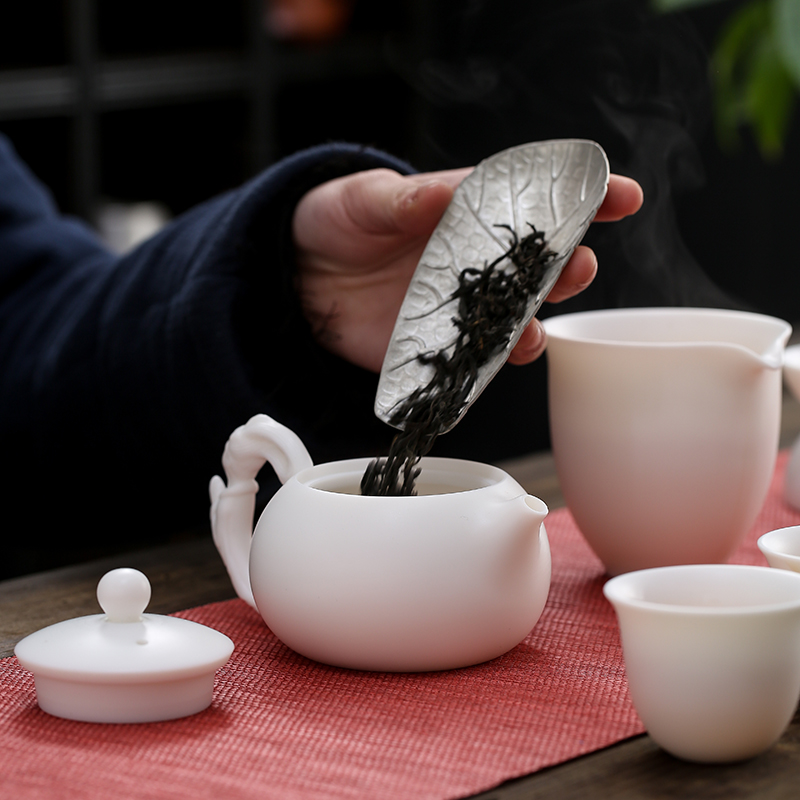 True, the fill four beauties of dehua white porcelain kung fu tea set home office cup of a complete set of the teapot