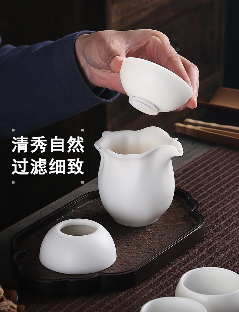 True sheng Chinese white dehua white porcelain kung fu tea set sealed ball hole side put the pot of tea of a complete set of gift set