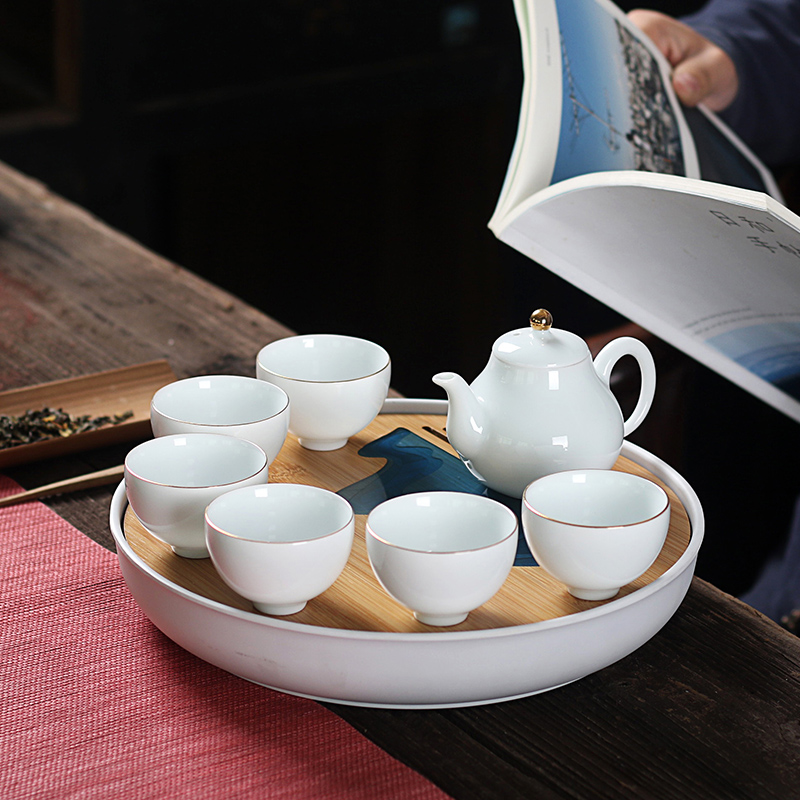 Really hold high white porcelain tea set household contracted teapot teacup water storage of a complete set of kung fu tea table dry terms plate