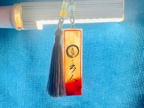 The hand-carved Laos stone pendant of the same style is just a little bit weathered.