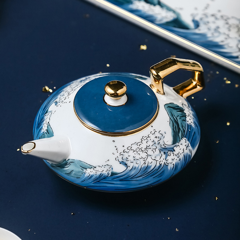 Ceramic kung fu tea set suit household creative tea cup teapot tea tea tea art gifts sitting room
