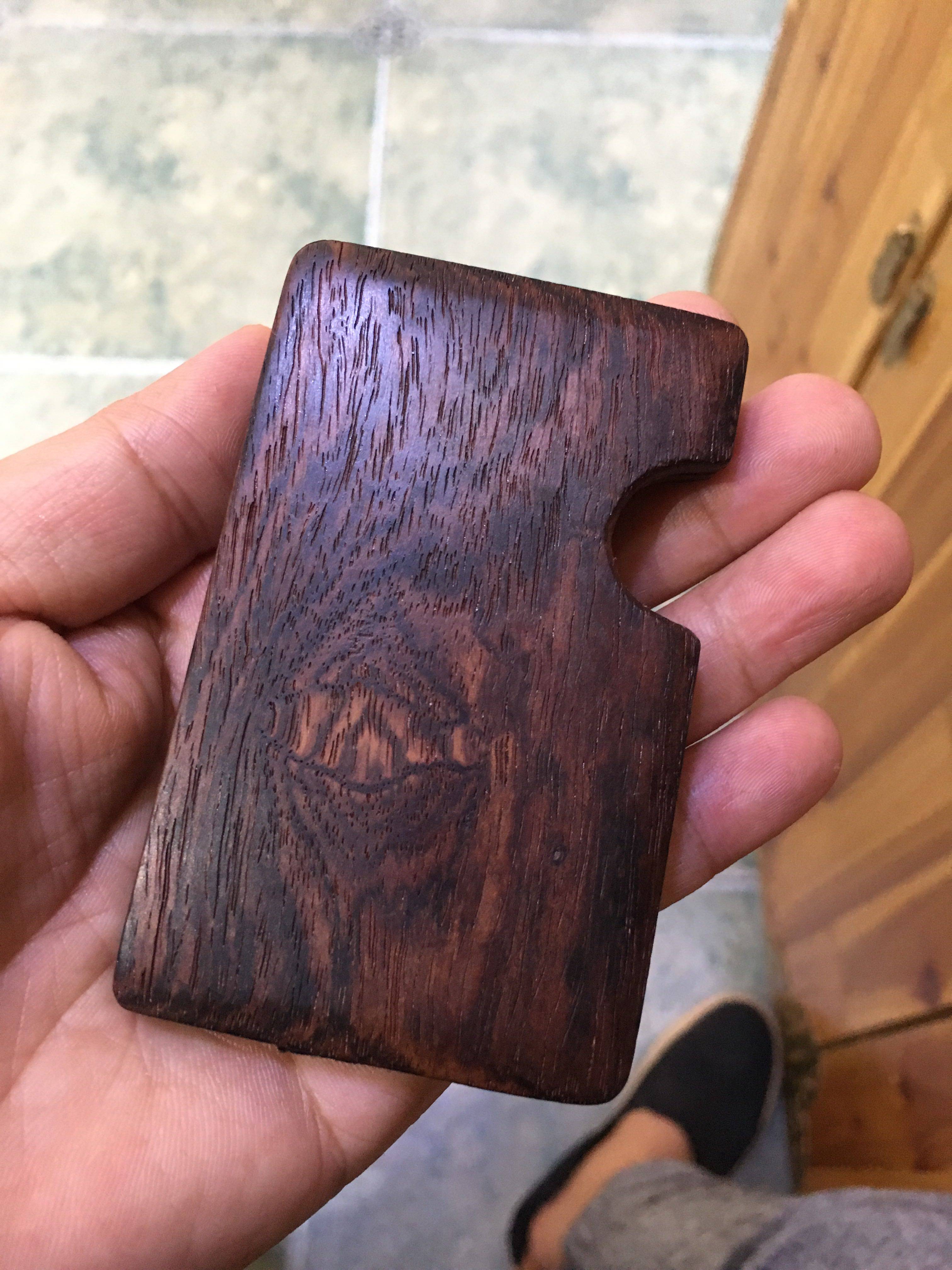 Hand-in-hand red wood card holder